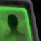 the silhouette of a person over a green background