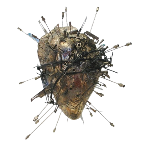 a metal heart with pins in it