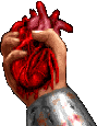 a hand holding a bloody heart